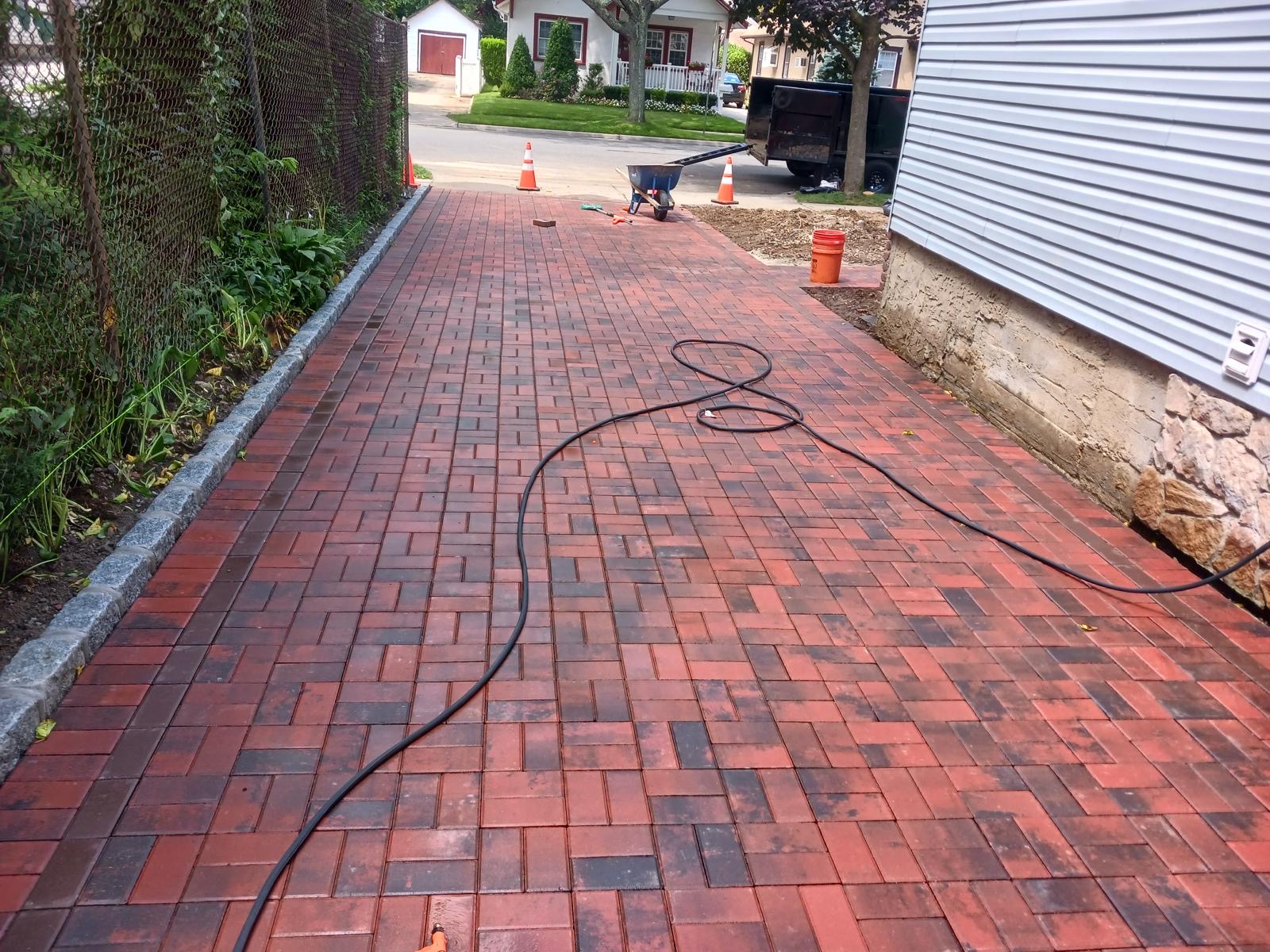 Red paver driveway and patio project